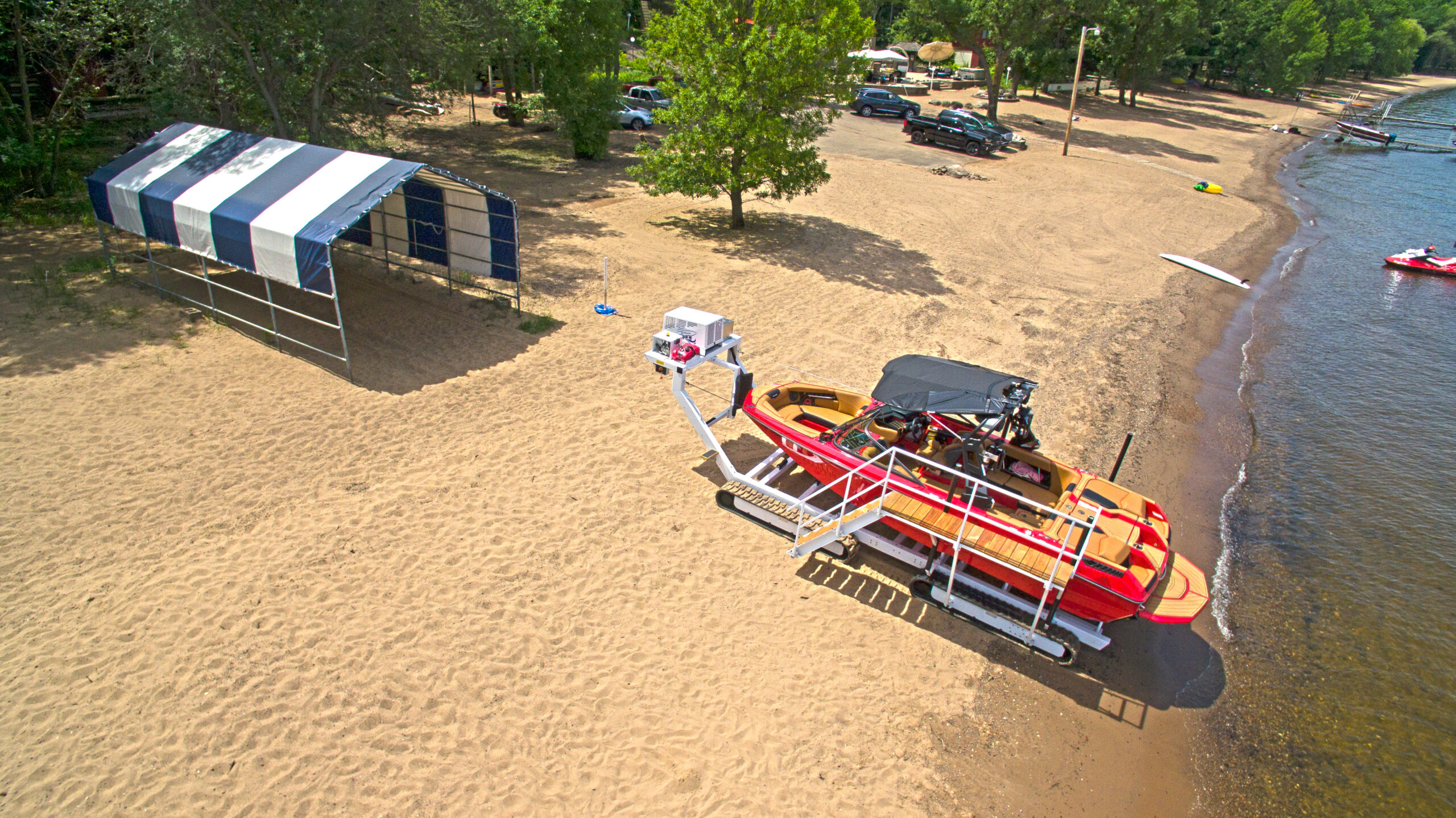 Boat on beach showing low water launch challenges